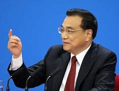 娄勤俭与全国人代会闭幕总理记者会的缺席与时代变迁